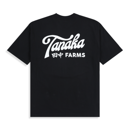 Black t-shirt with 'Tanaka Farms' logo on a white background